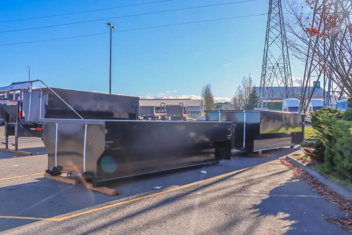 Roll-off dumpster ready for waste disposal at job site for 2 Yard Dumpster Rental in Winthrop Harbor